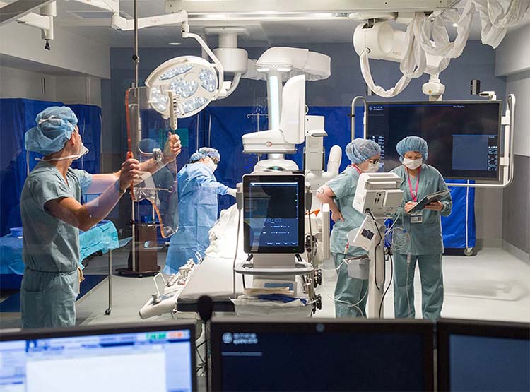 doctors performing surgery on a patient