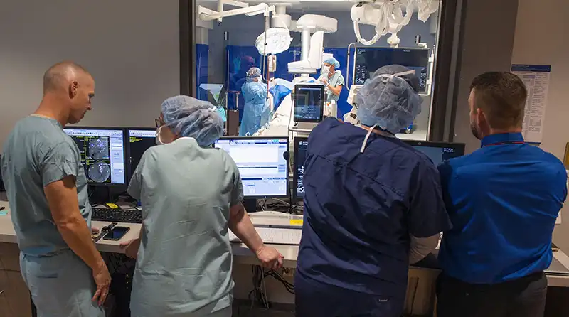 oncology team overlooking procedure